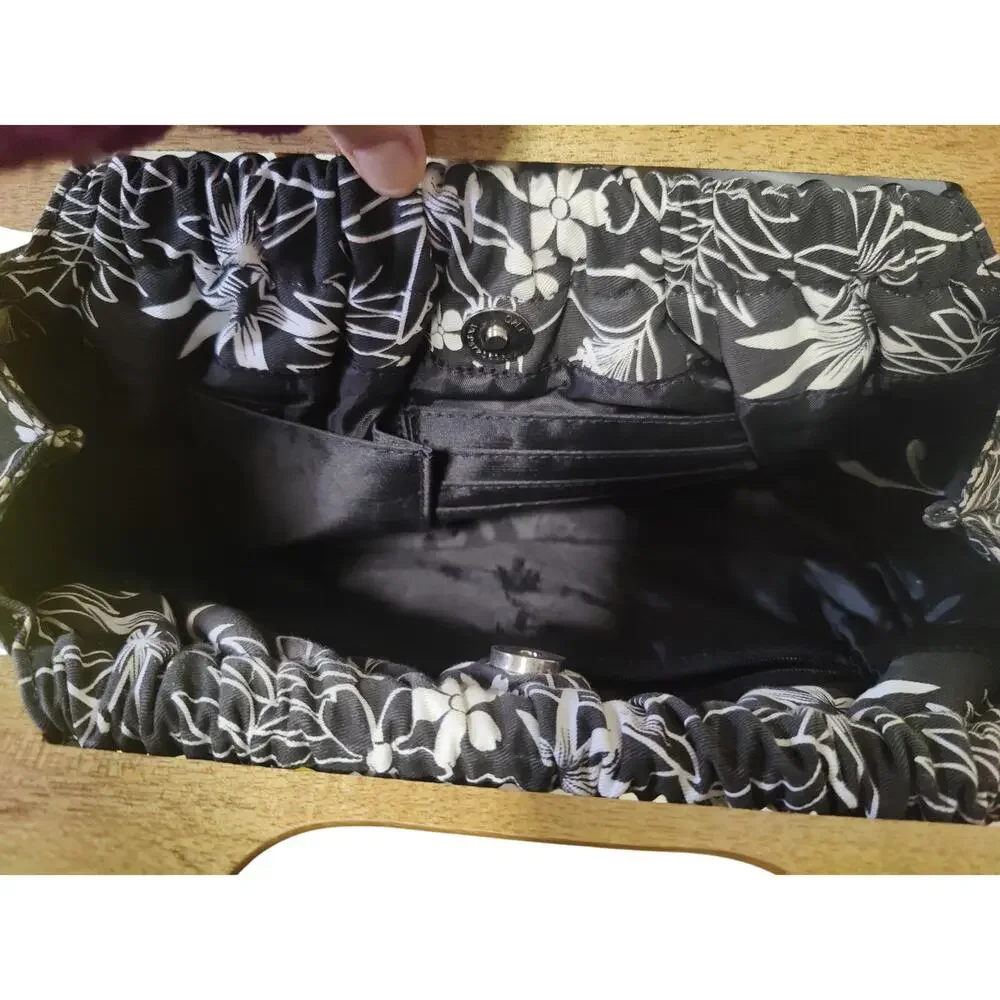 Black/white floral coquette top handle bag